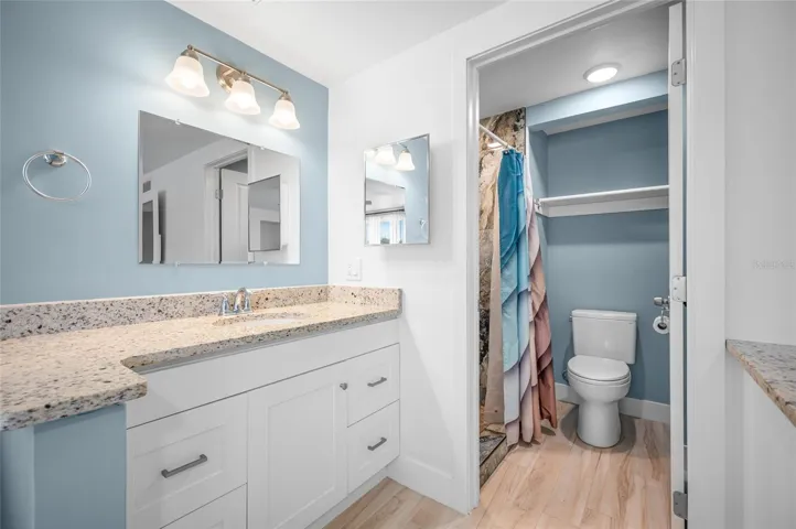 Ensuite primary bathroom with GRANITE COUNTER TOP