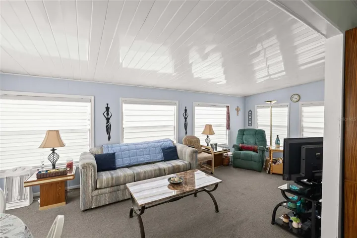 The living room is just off the dining space