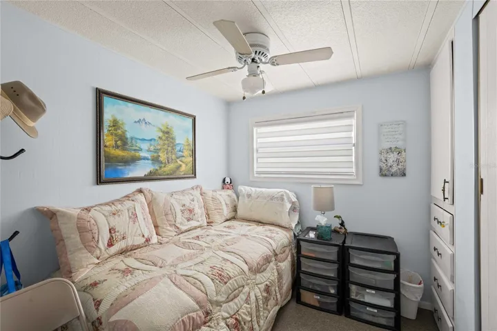 The guest bedroom has a day bed and is very cozy