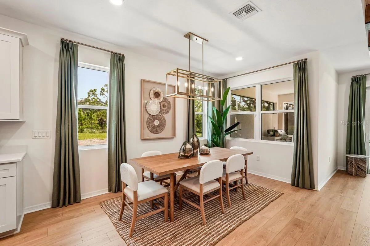 Dining Room-Photo description represents the model home of same floor plan.