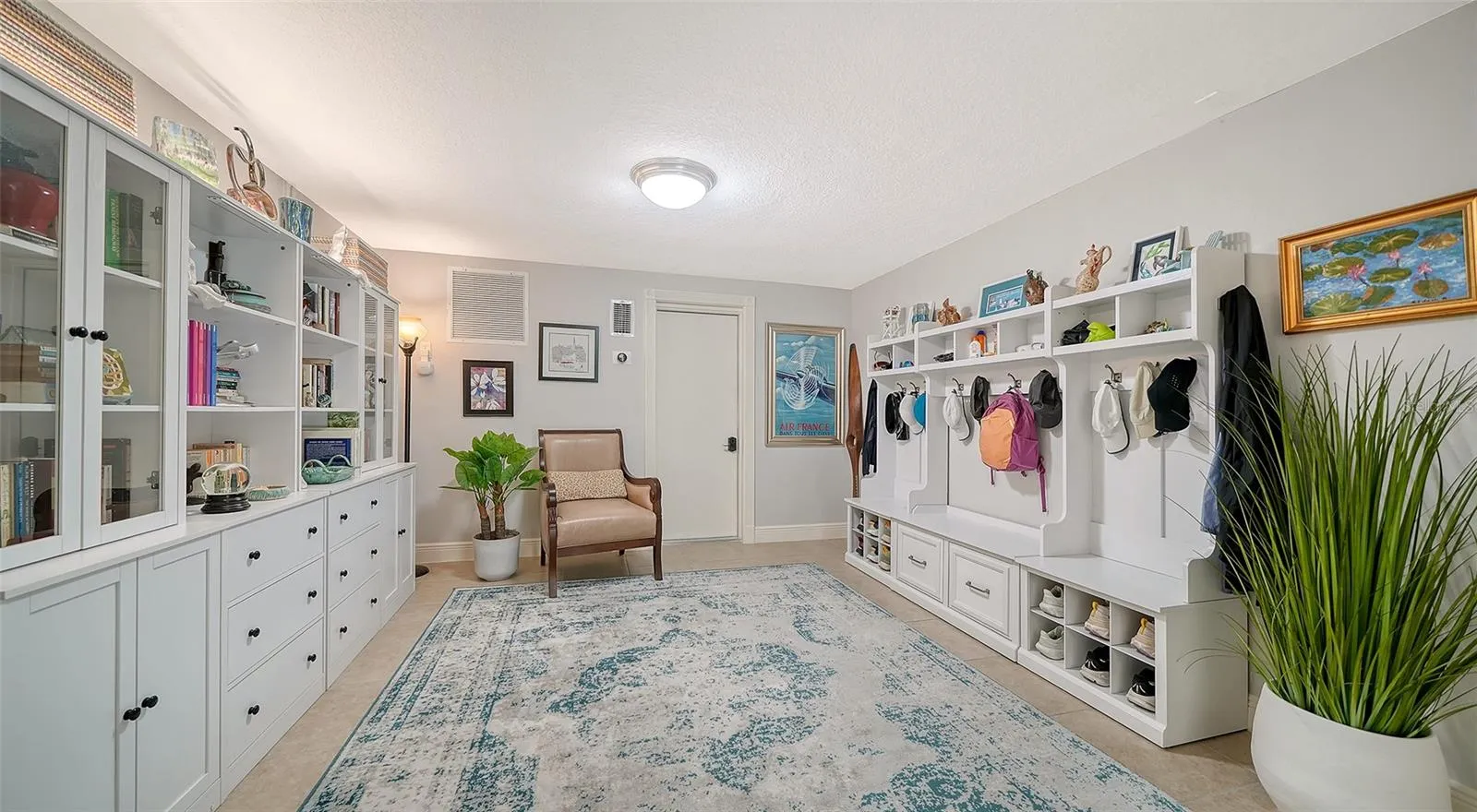 Another view highlighting the extensive built-in cabinetry and storage.