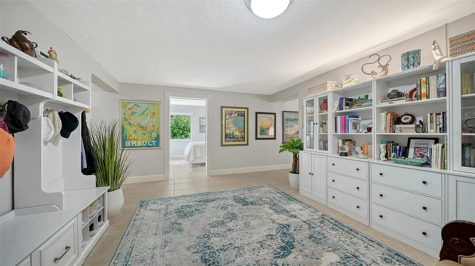 Custom built-ins provide exceptional storage in the lower-level bonus area.