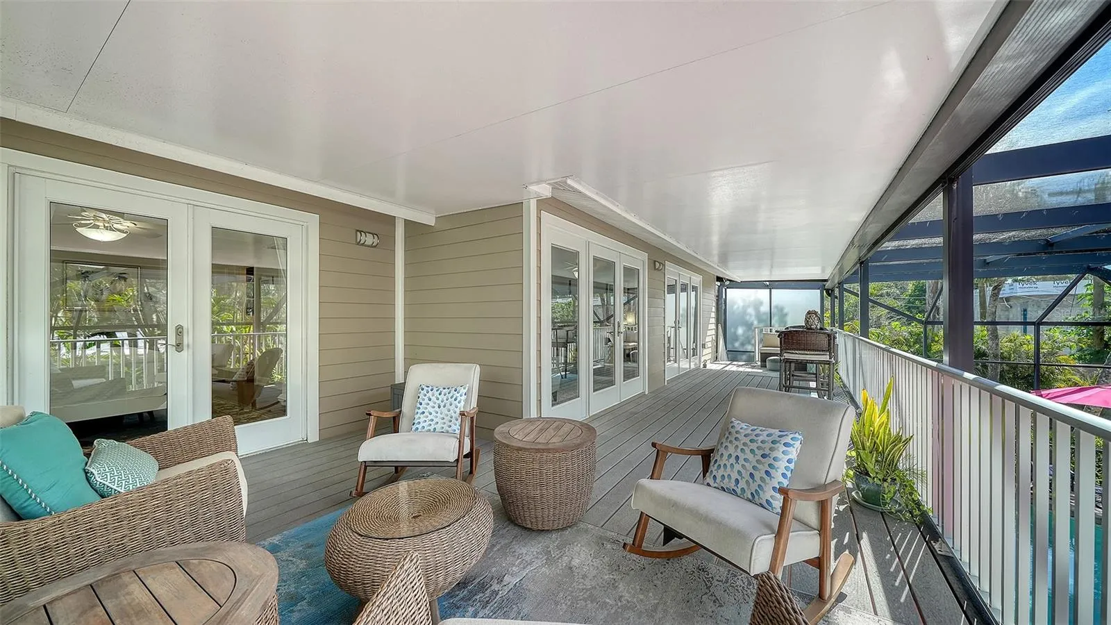 Additional view of the primary suite and its direct access to outdoor living space.