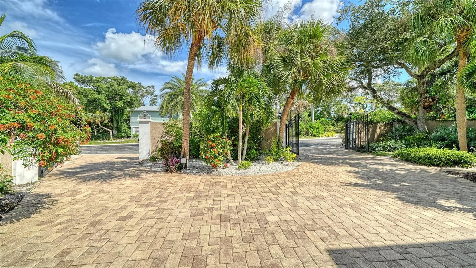 Expansive paver driveway, resurfaced in 2025, provides plenty of space for parking.