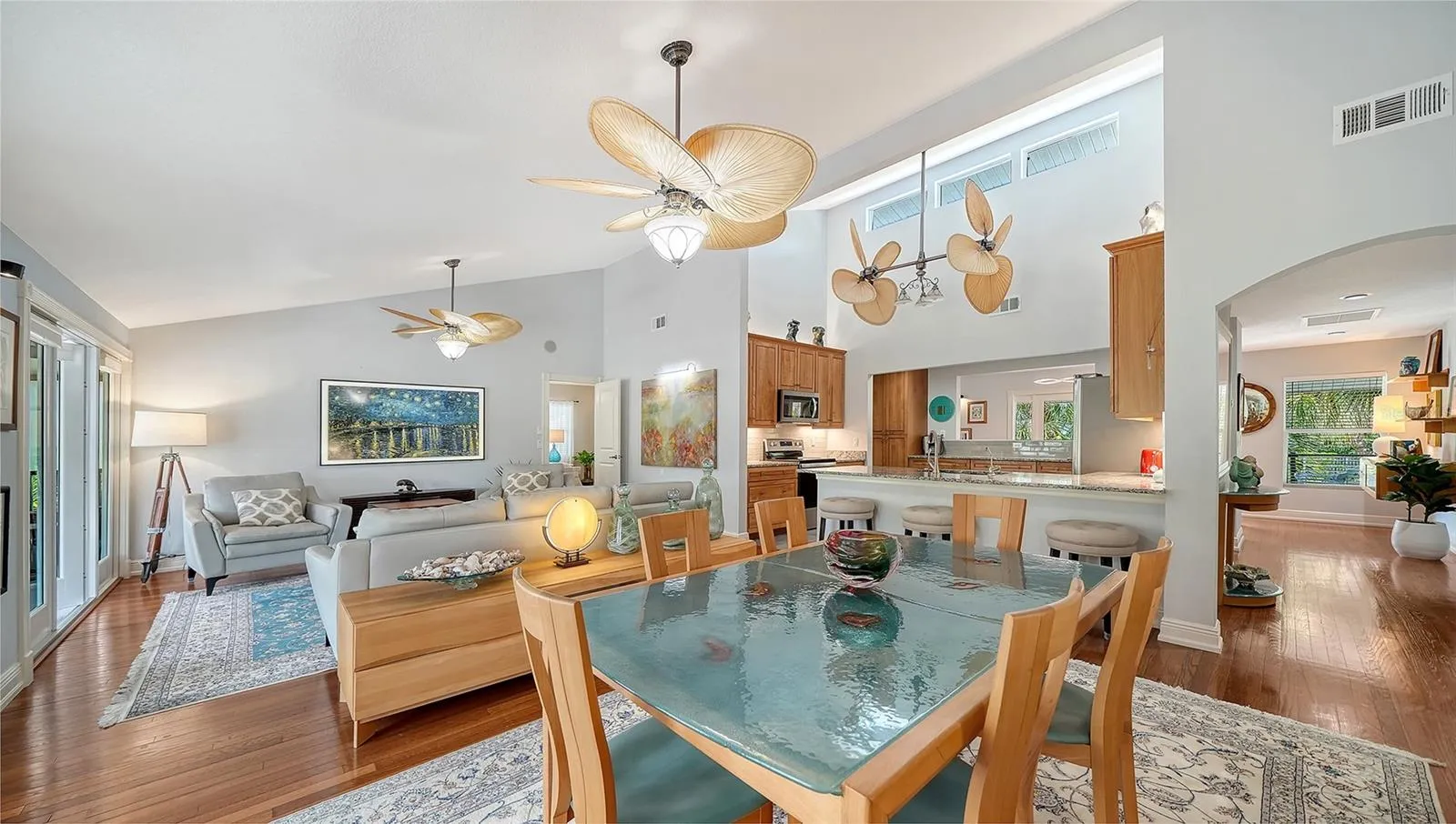 Open dining area flows easily between the kitchen, living room and outdoor spaces.