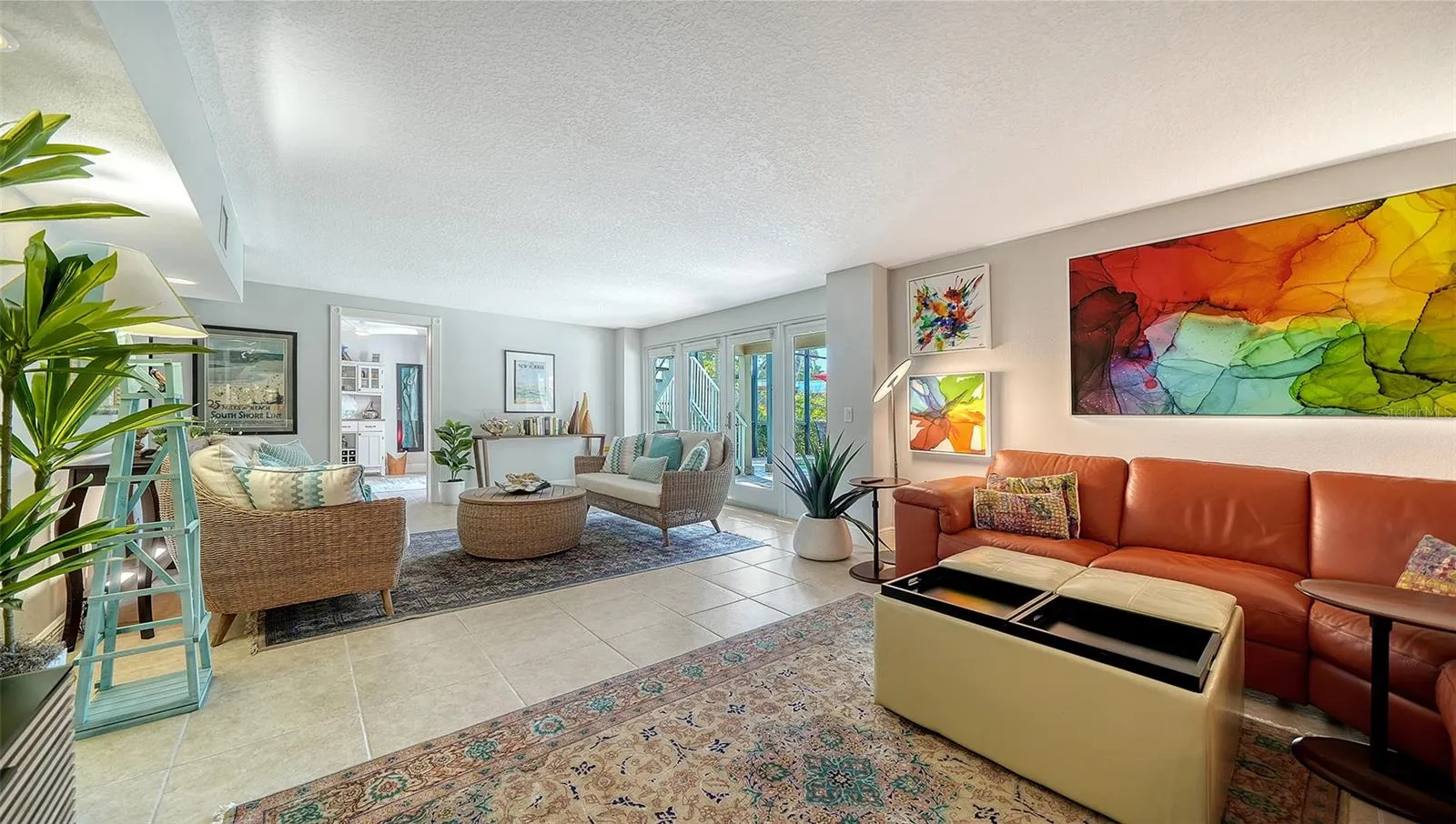Bright family room creates a comfortable second living and entertaining area.