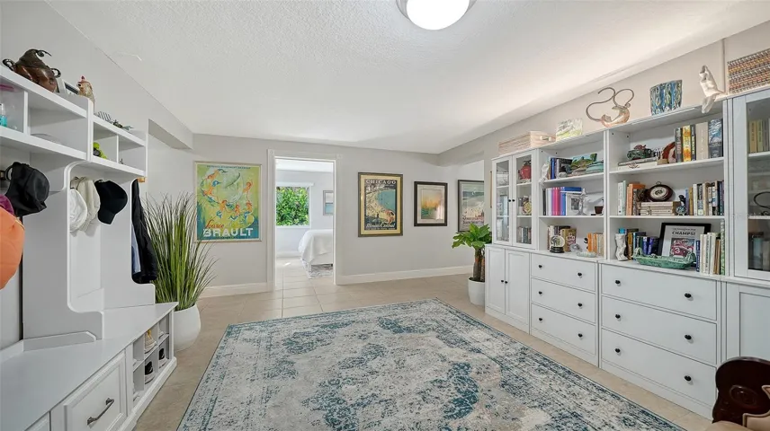 Custom built-ins provide exceptional storage in the lower-level bonus area.