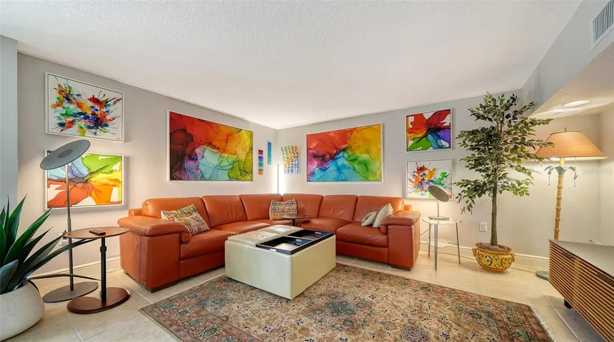 Generously sized lower-level family room provides multiple options for relaxing and entertaining.