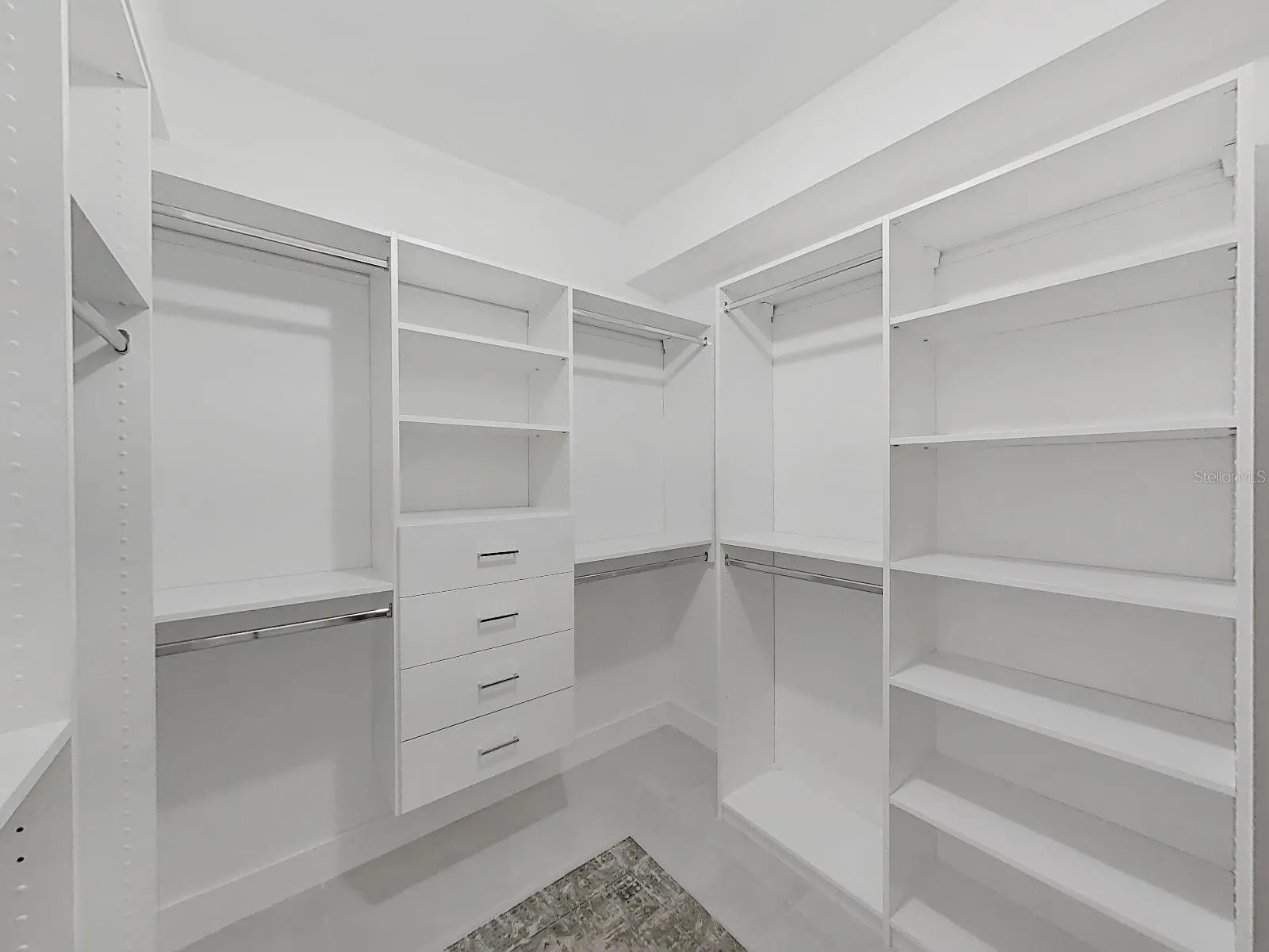 large closet with custom organizing