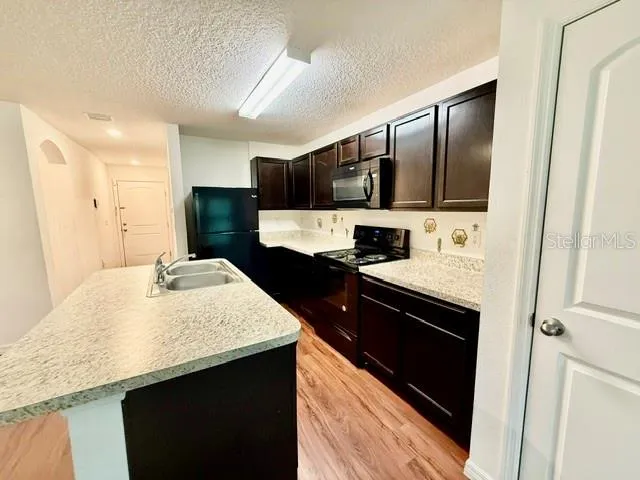 VIEW OF ENTRANCE FROM KITCHEN