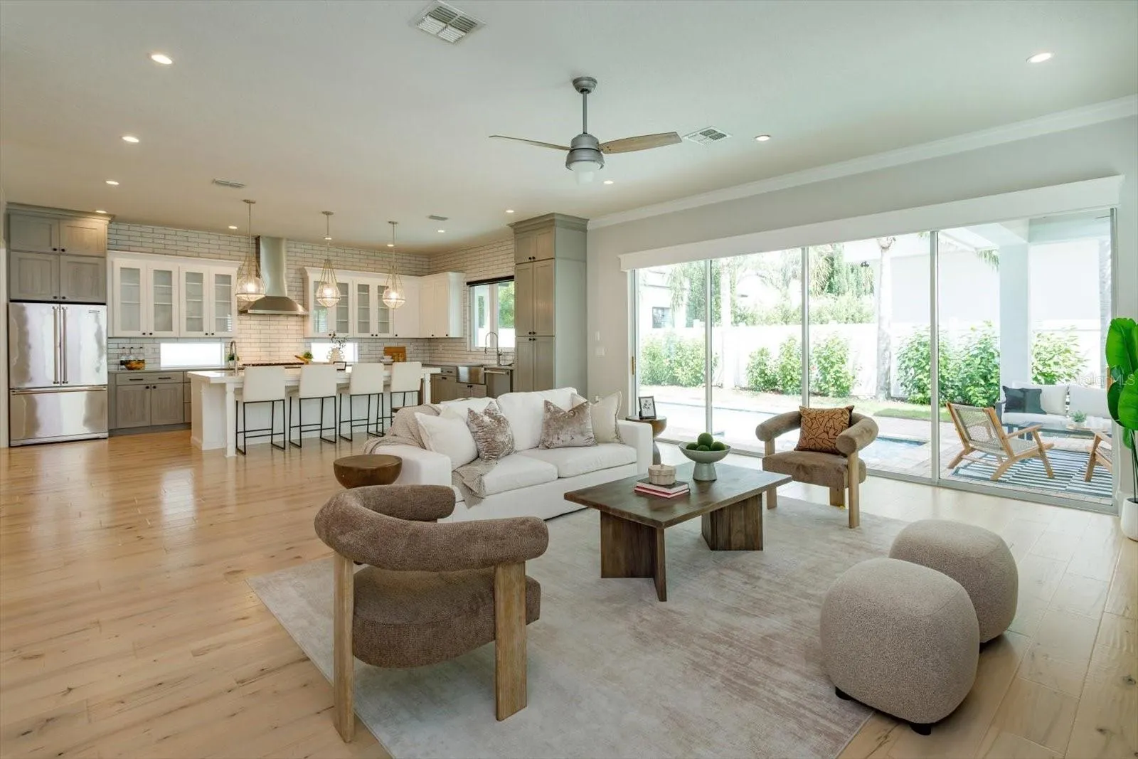 Great room opens up to lanai with floor to ceiling sliders