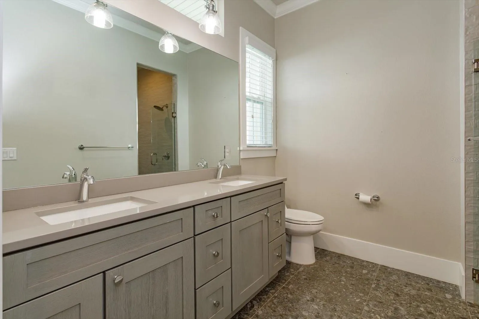 First floor study ensuite with dual sinks and shower