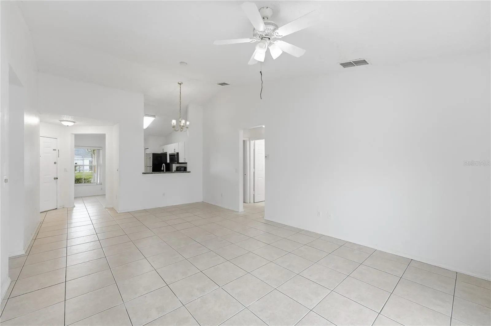 Bright, open living space with vaulted ceiling