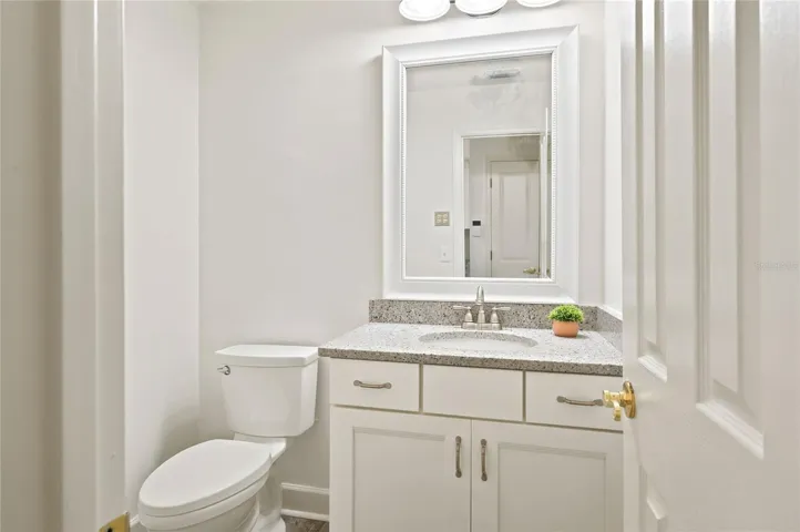 Guest bath located off family room