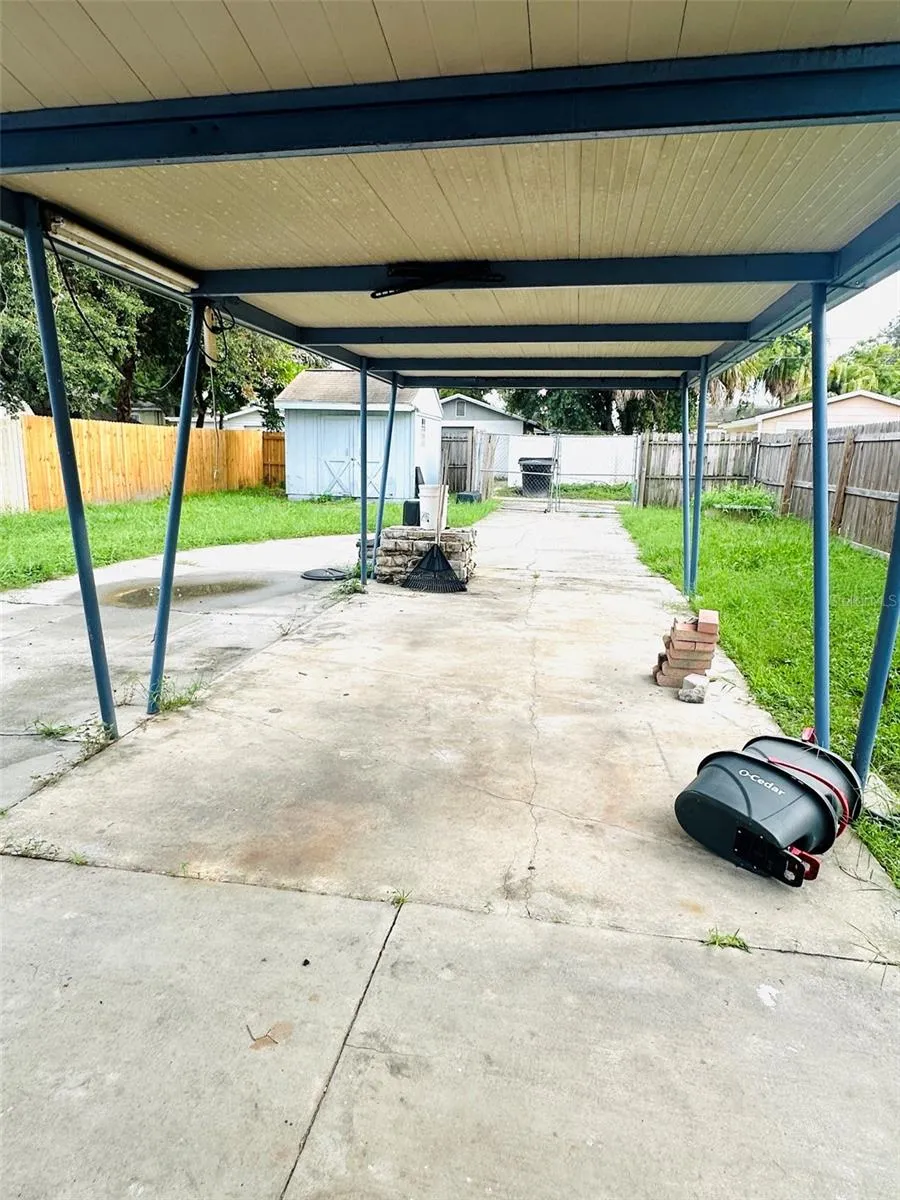Carport at rear of house on the Alley side