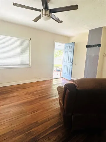 Living Room, looking at open front door.