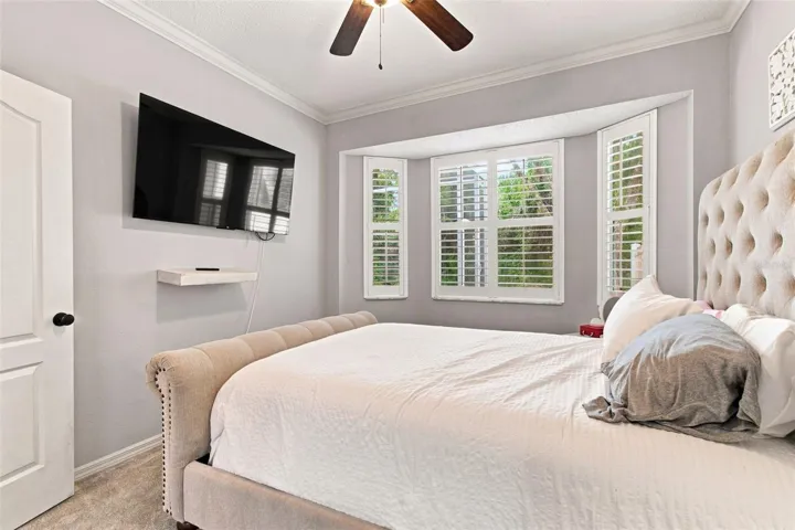First Floor Primary Bedroom w/Bay Window, Crown Moulding &amp; Plantation Shutters