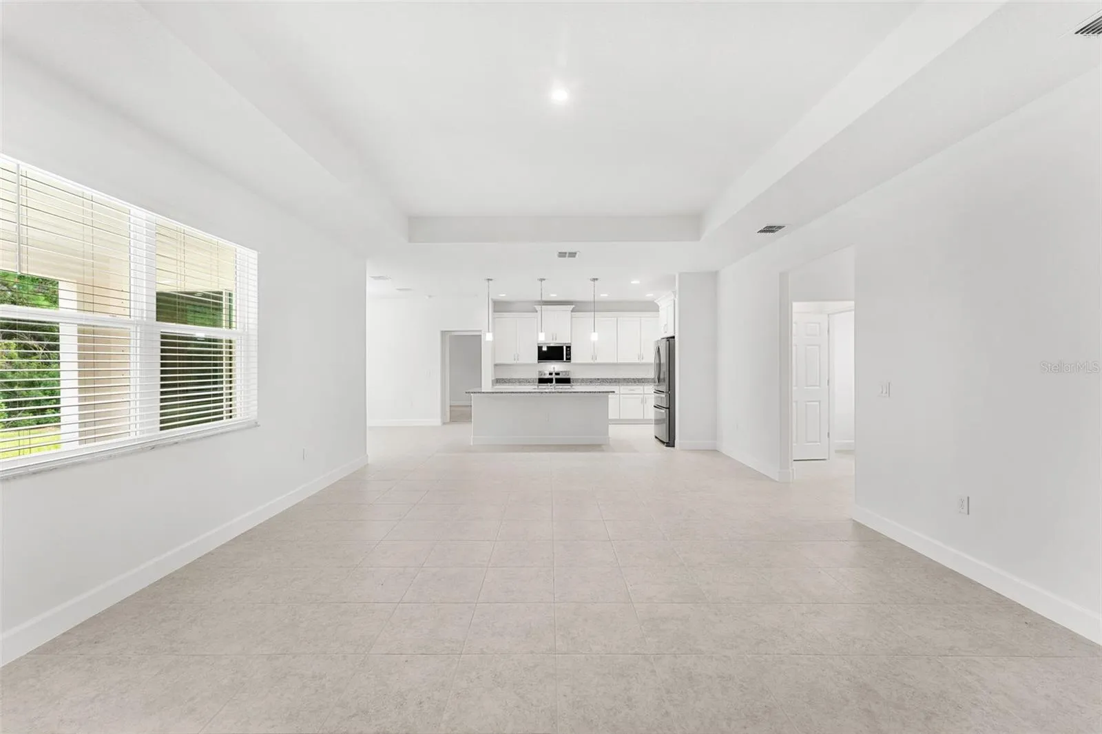 Tile throughout the main living spaces for everyday durability.