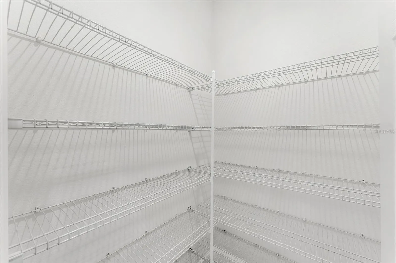 Walk in pantry with plenty of storage located in the kitchen.