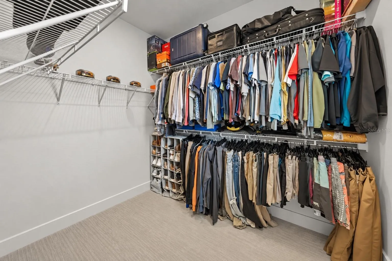 Smaller of the 2 walk in Owner's closets