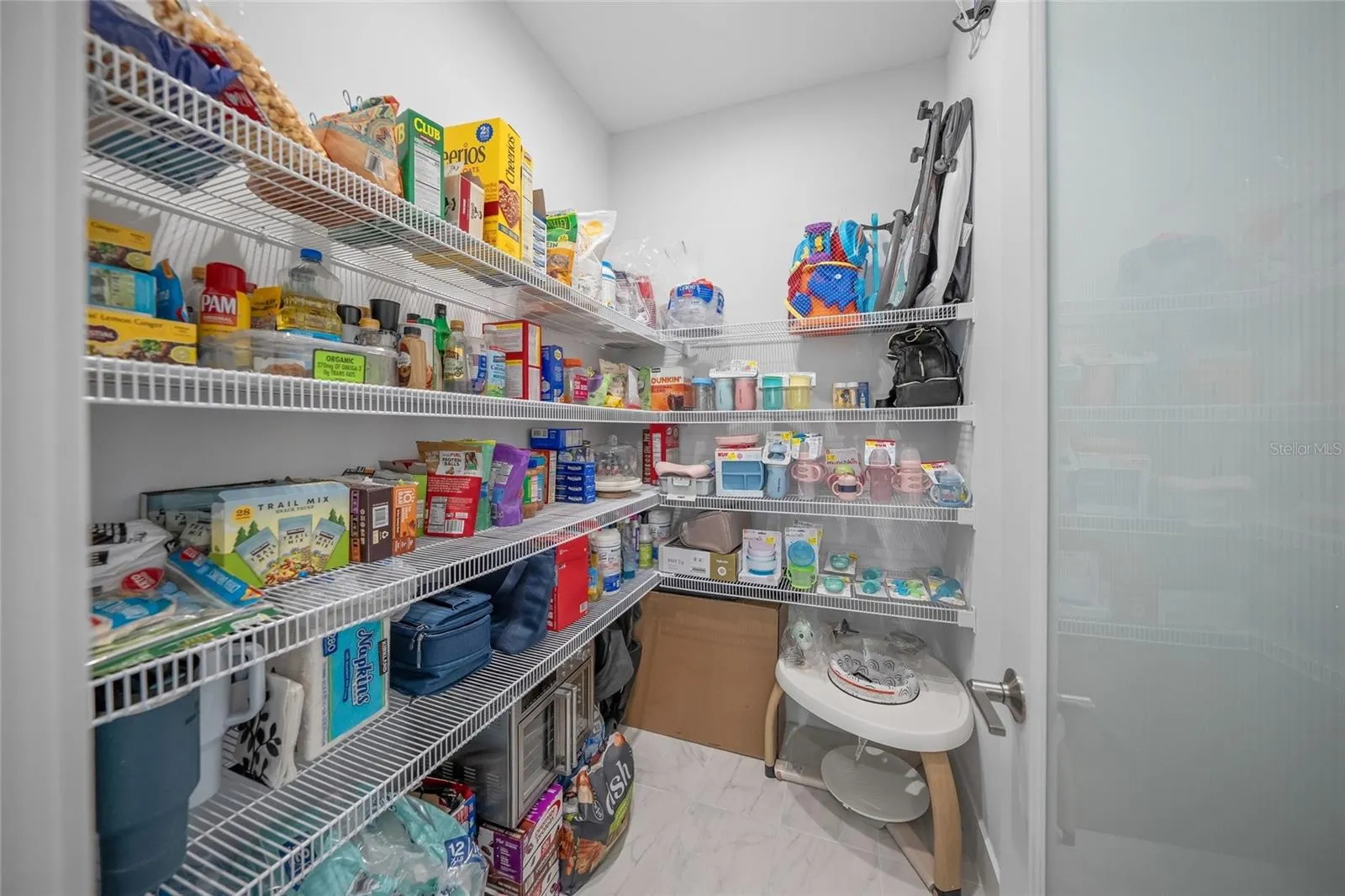 Spacious walk in pantry.