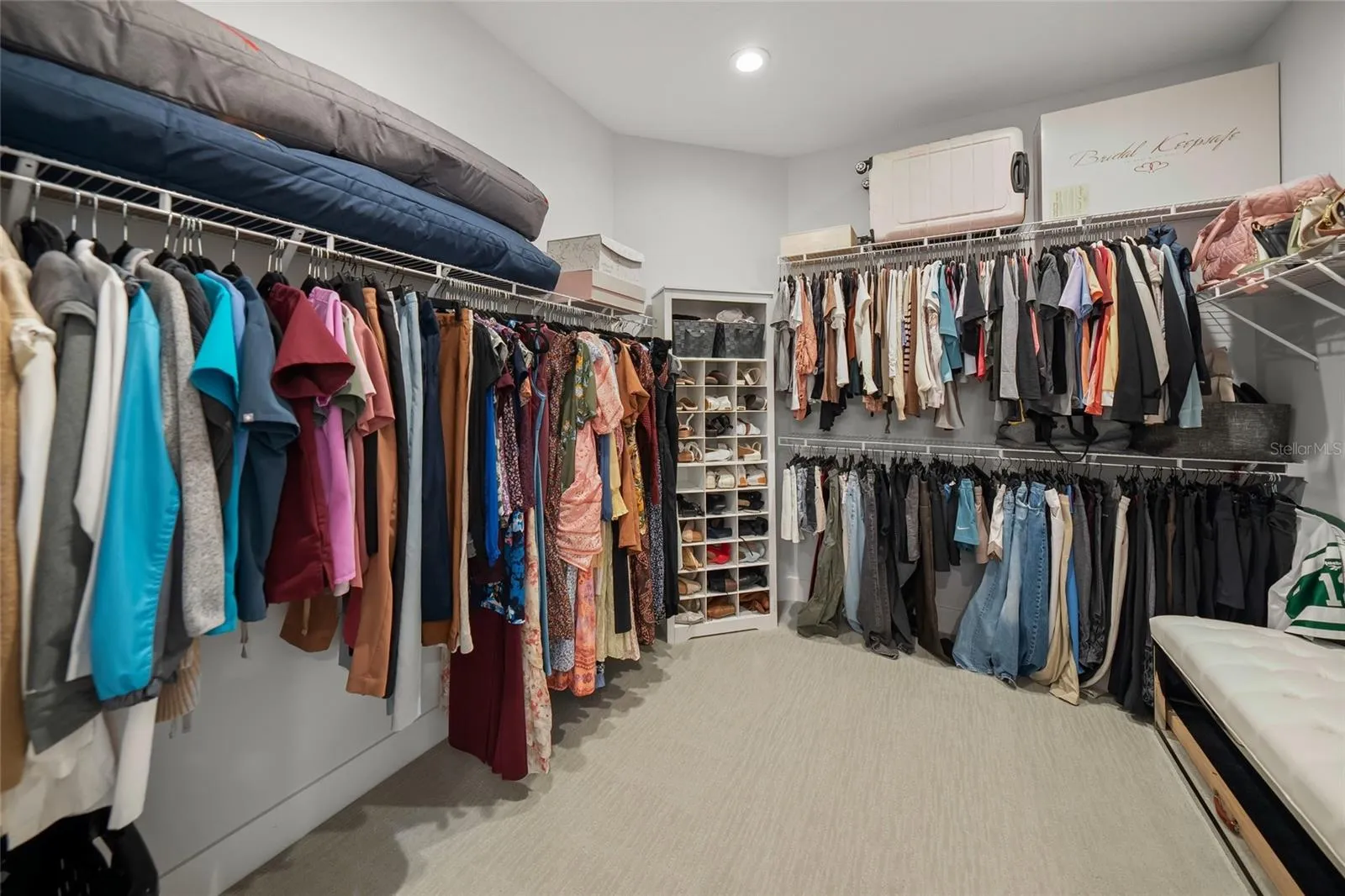 Larger of the 2 walk in Owner's closets