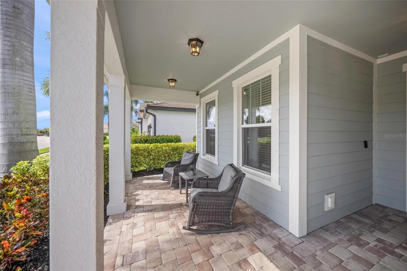 Inviting front porch for enjoying the community.