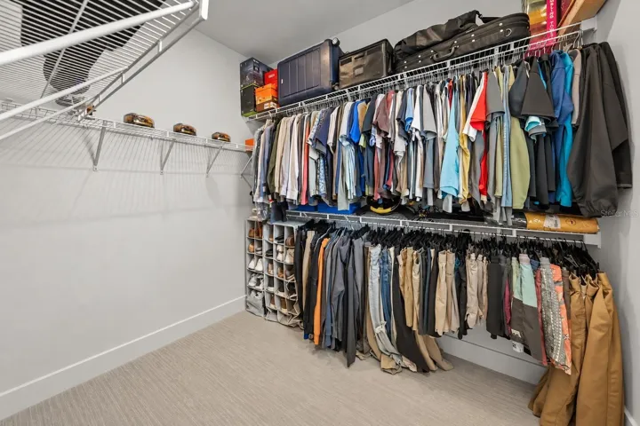 Smaller of the 2 walk in Owner's closets