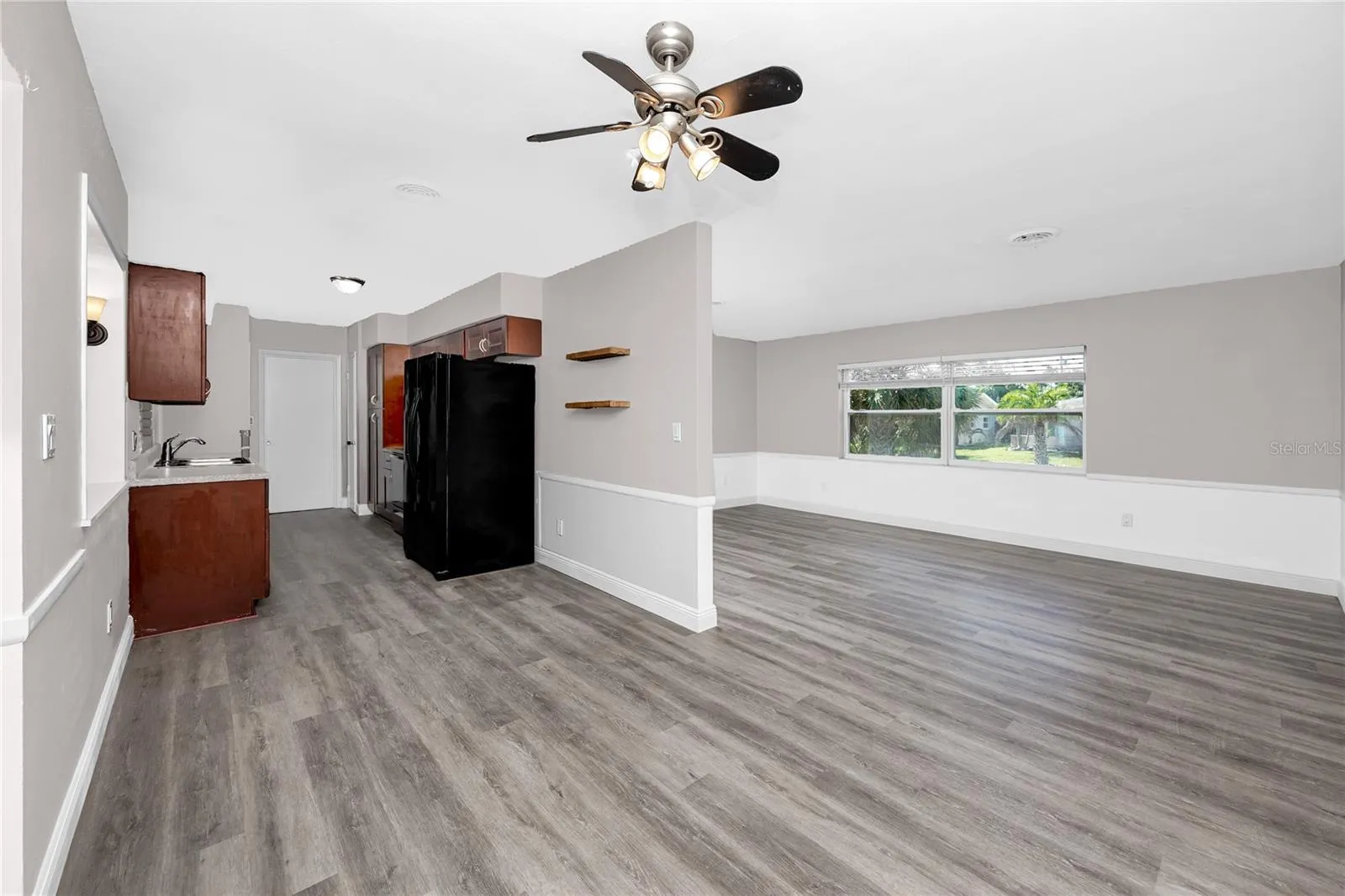 Dining room with a view of the kitchen.