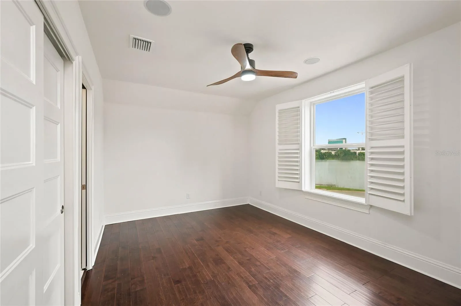 Bedroom 2 with window overlooking Lake Formosa
