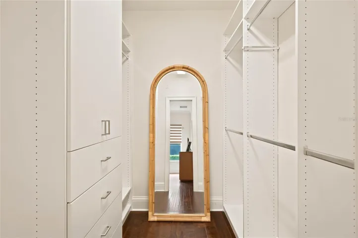 One of two walk-in customized closets in Owners suite