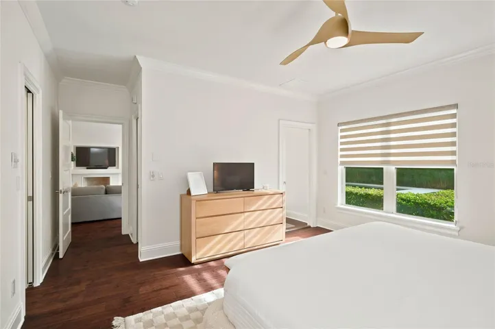 Owners suite with big windows overlooking the backyard