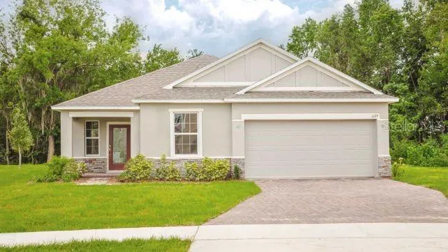 Model home - actual lot & features may vary. - Actual home has a 3-car garage.