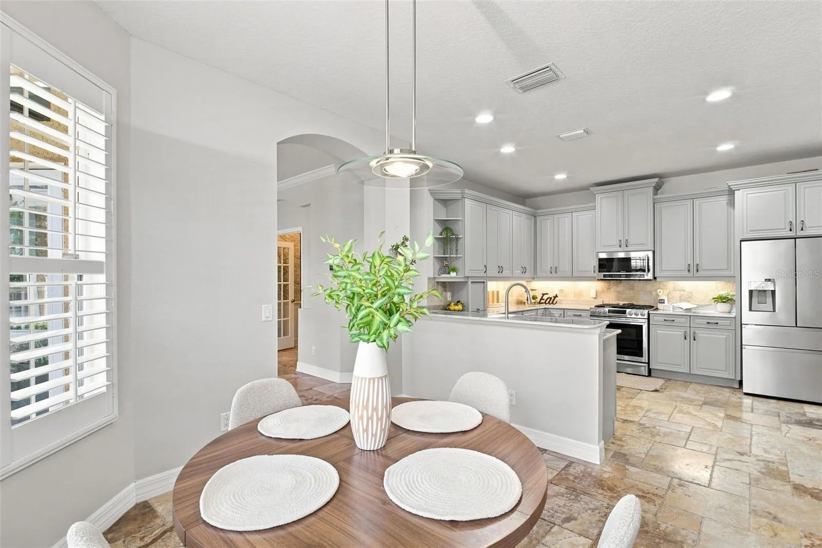 Breakfast nook. Tile thoroughout the home.