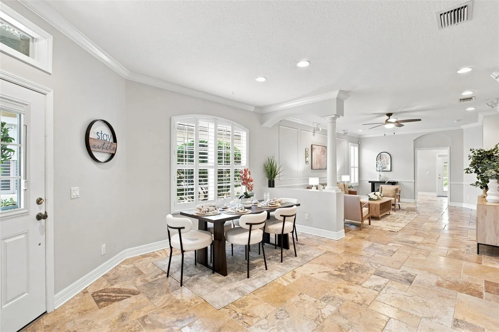 Dining room, front entrance to the right. Bonus room behind the living room out to the lanai.