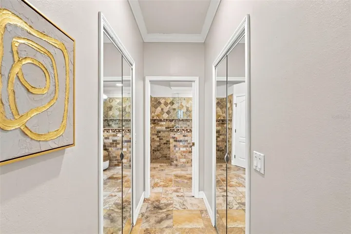Dual walk in closets in primary bedroom / ensuite