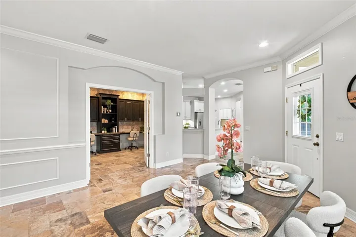 Dining room / looking to the office. Kitchen / breakfast nook on the right.