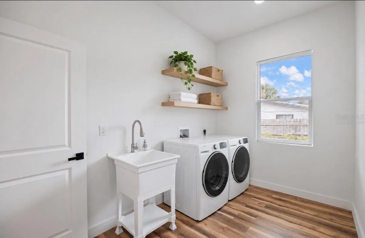 Virtually staged inside  laundry room