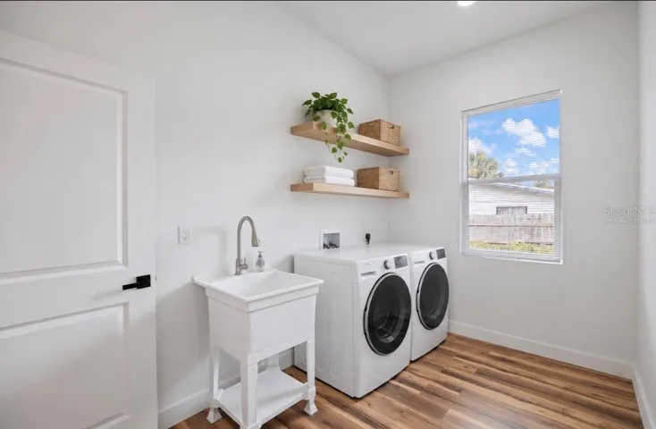 Virtually staged inside  laundry room