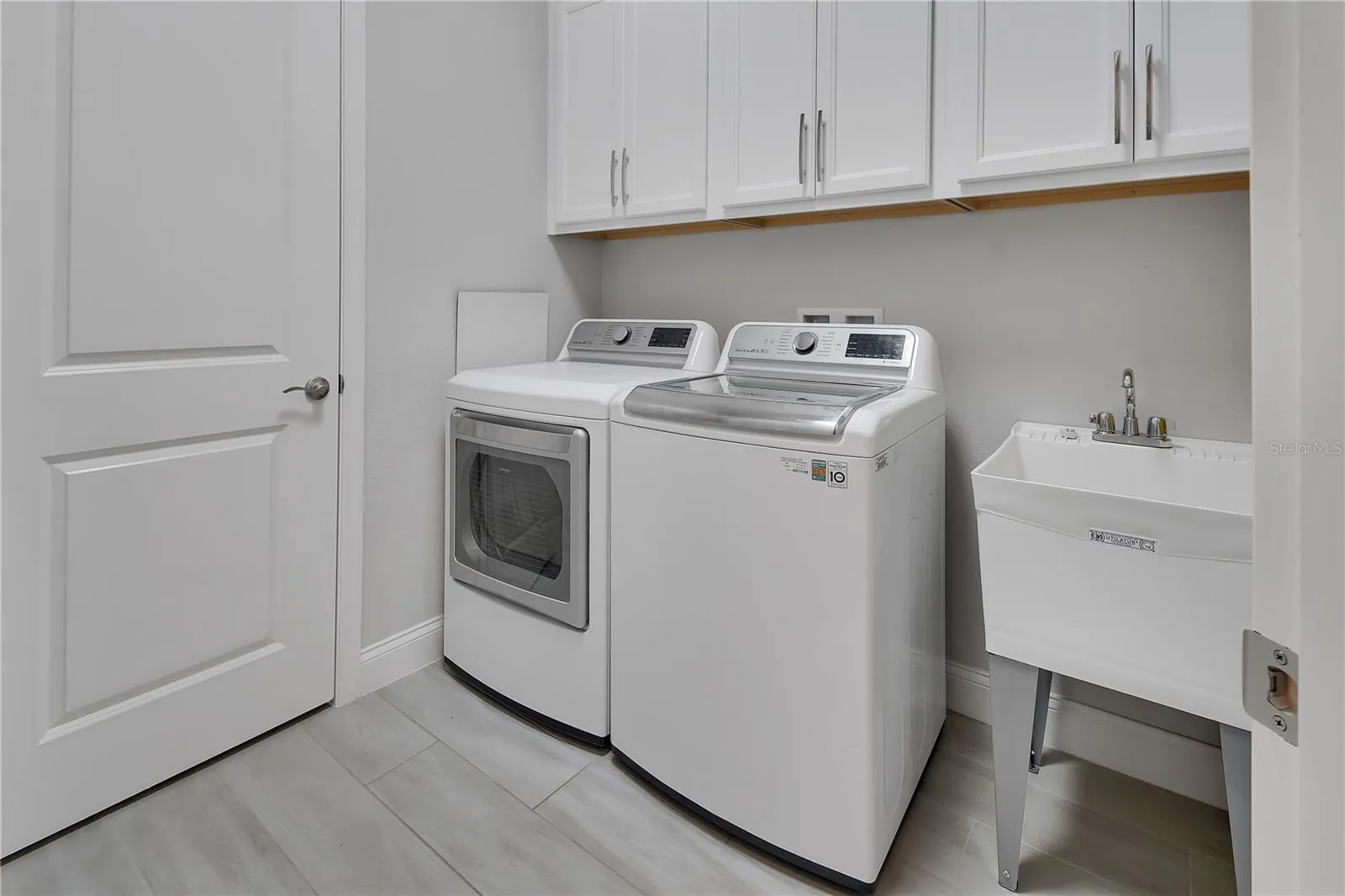 Laundry room with secondary pantry/closet