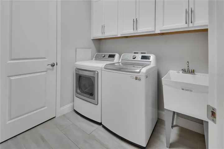 Laundry room with secondary pantry/closet