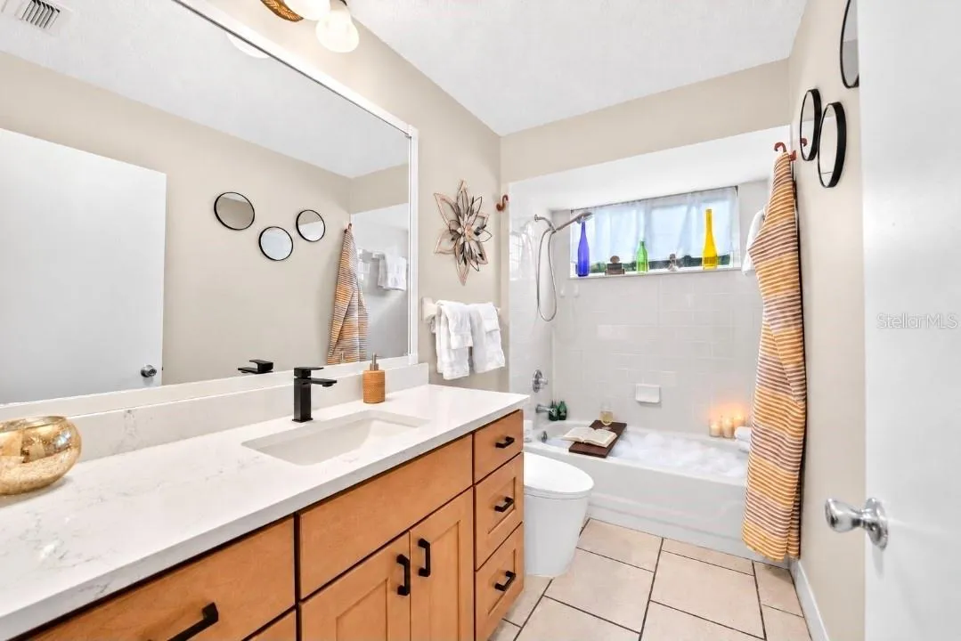 Guest Bath with QUARTZ, new ergo vanity, faucet, lights