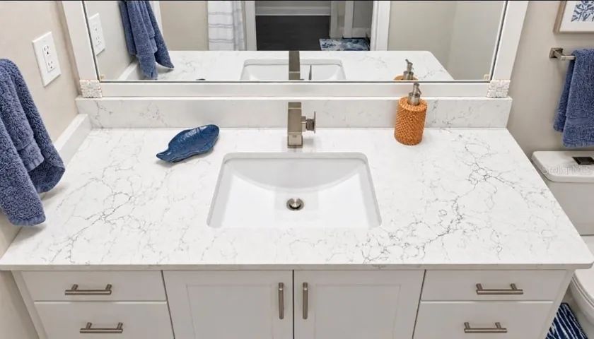 Quartz completes this look. modern sink, modern faucet and ergo height vanity