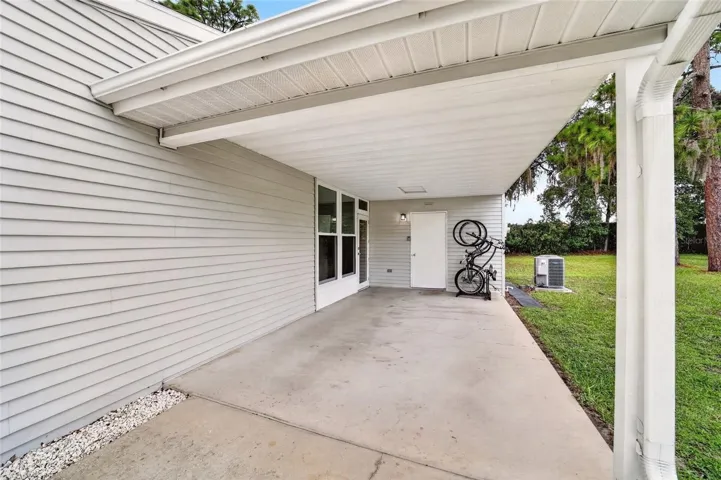 Carport and Driveway  Parking and attached shed for more STORAGE