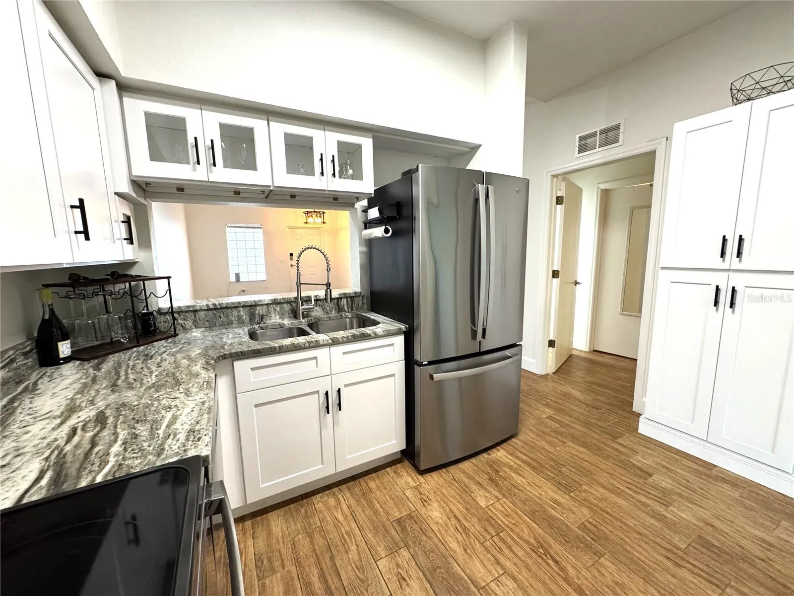 Kitchen with bonus pantry cabinet
