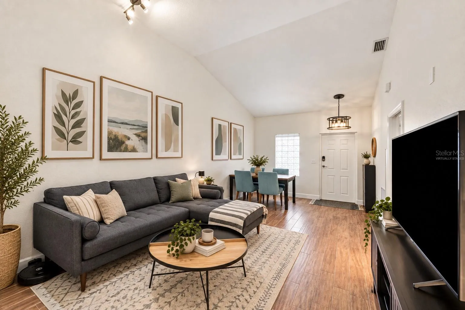 Great room with soaring ceiling (virtually staged)