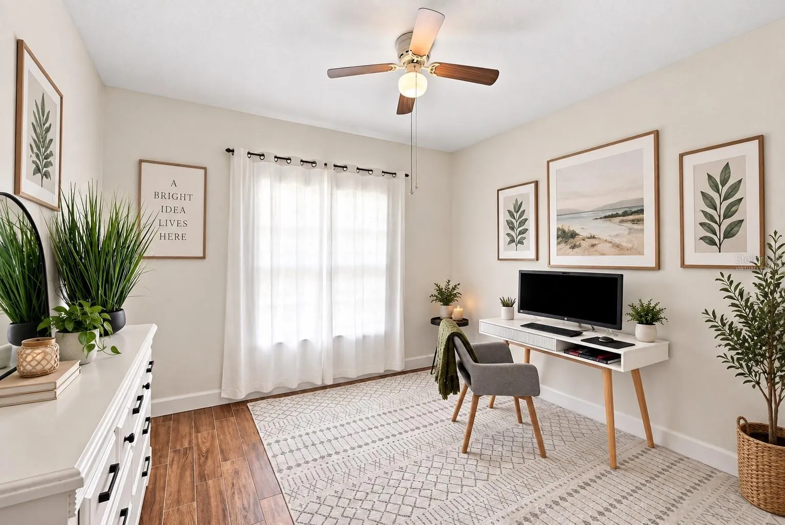 Guest bedroom with space for a king bedroom set or use as an office (virtually staged)