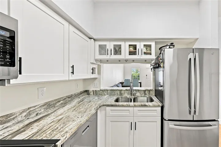 Updated kitchen with passthrough to great room/dining area
