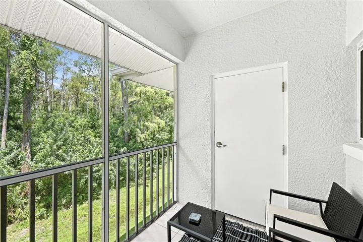 Screened lanai with storage room