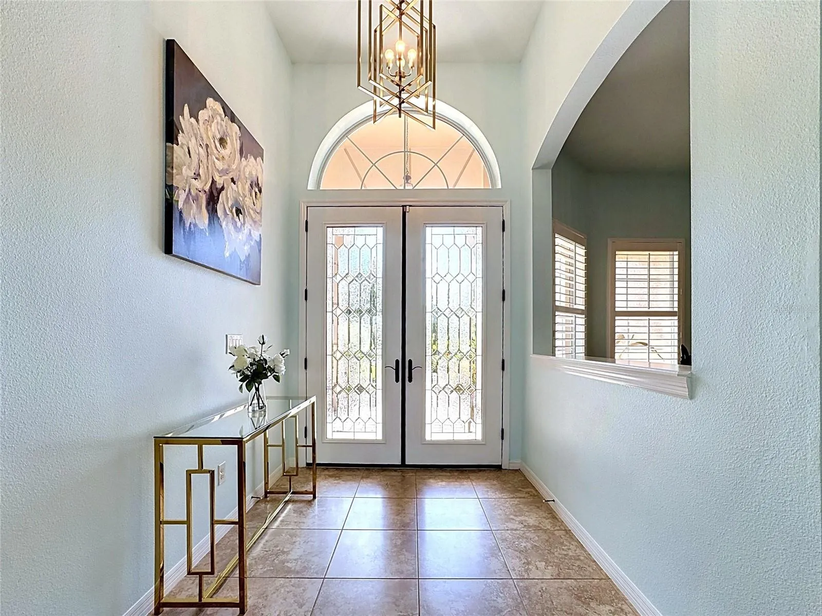 Double Glass Entry Doors into Foyer